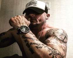 He is a tattoo freak and has several tattoos on both of his arms.